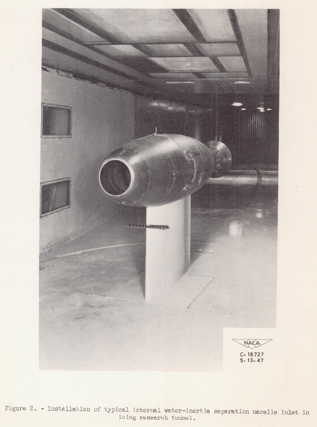 Figure 2 of NACA-RM-E8A27. Installation of typical internal water-inertia
separation nacelle inlet in icing research tunnel.